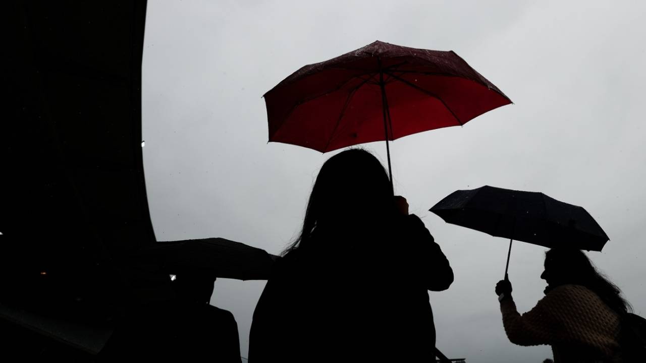 Umbrellas were out with rain delaying the start of the game, Prime Minister's XI vs Indians, Canberra, November 30, 2024