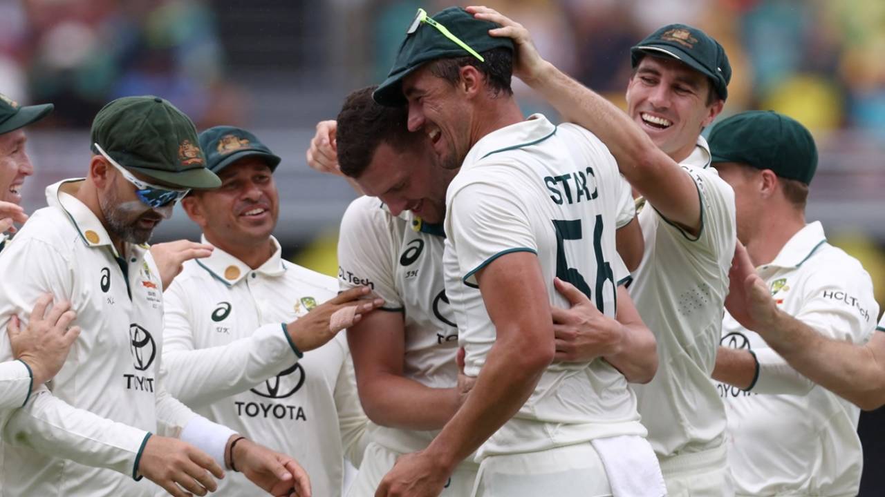 Josh Hazlewood and Pat Cummins celebrate Virat Kohli's wicket with Mitchell Starc, Australia vs India, 3rd Test, Brisbane, 3rd day, December 16, 2024