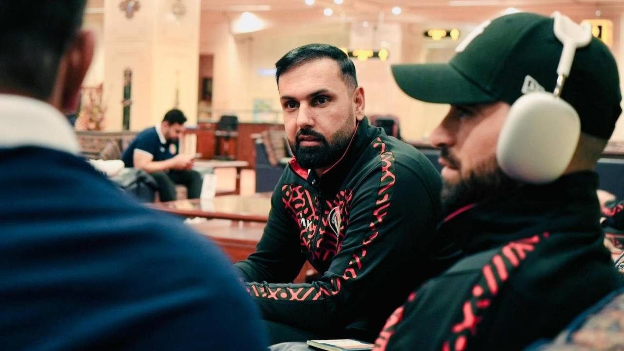 Mohammad Nabi relaxes at the airport upon his arrival, Lahore, February 12, 2025