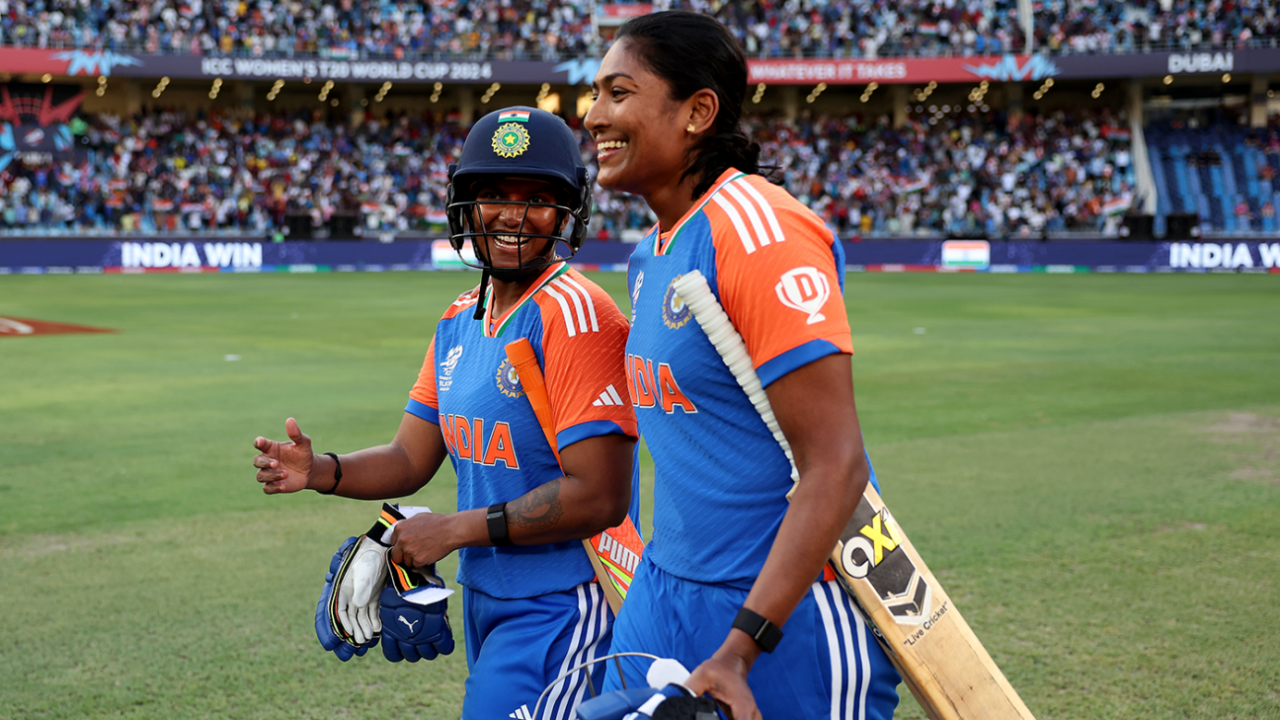 Deepti Sharma and S Sajana are all smiles as they walk back after completing the chase, India vs Pakistan, Women's T20 World Cup, Dubai, October 6, 2024