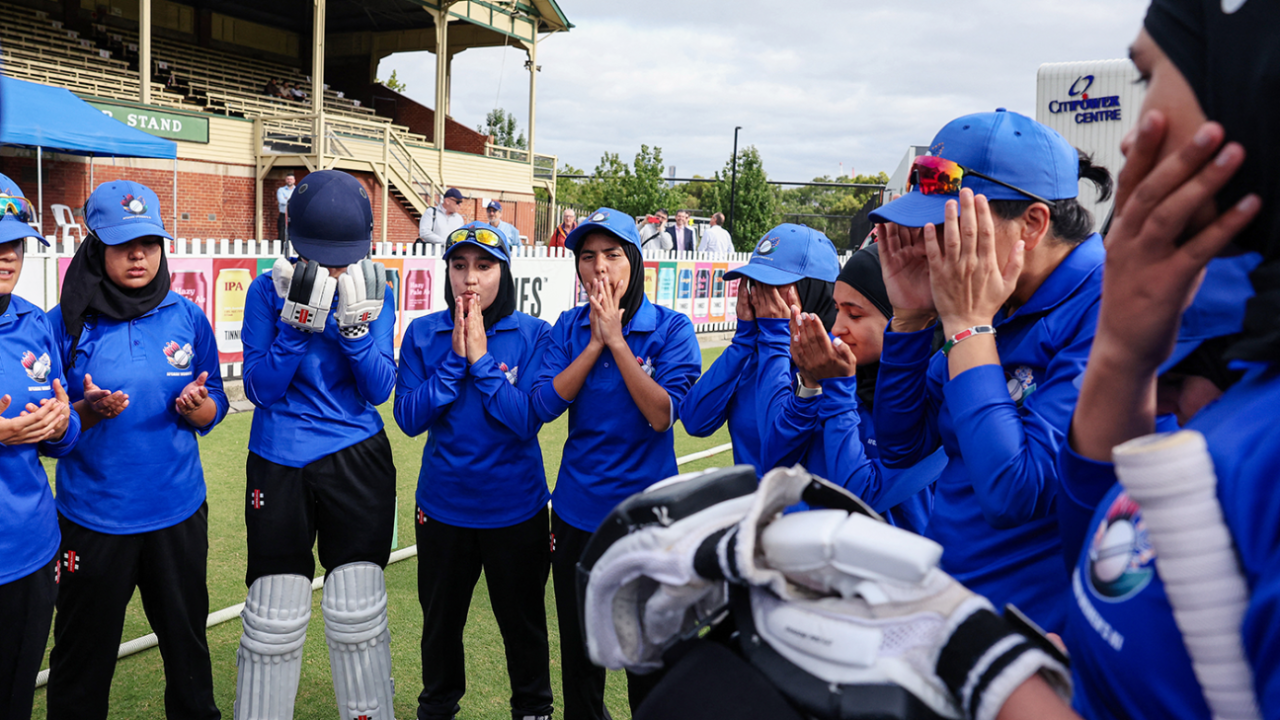 The exiled Afghanistan Women pray together before their match in Melbourne, Afghanistan Women's XI and Cricket Without Borders XI, Melbourne, January 30, 2025