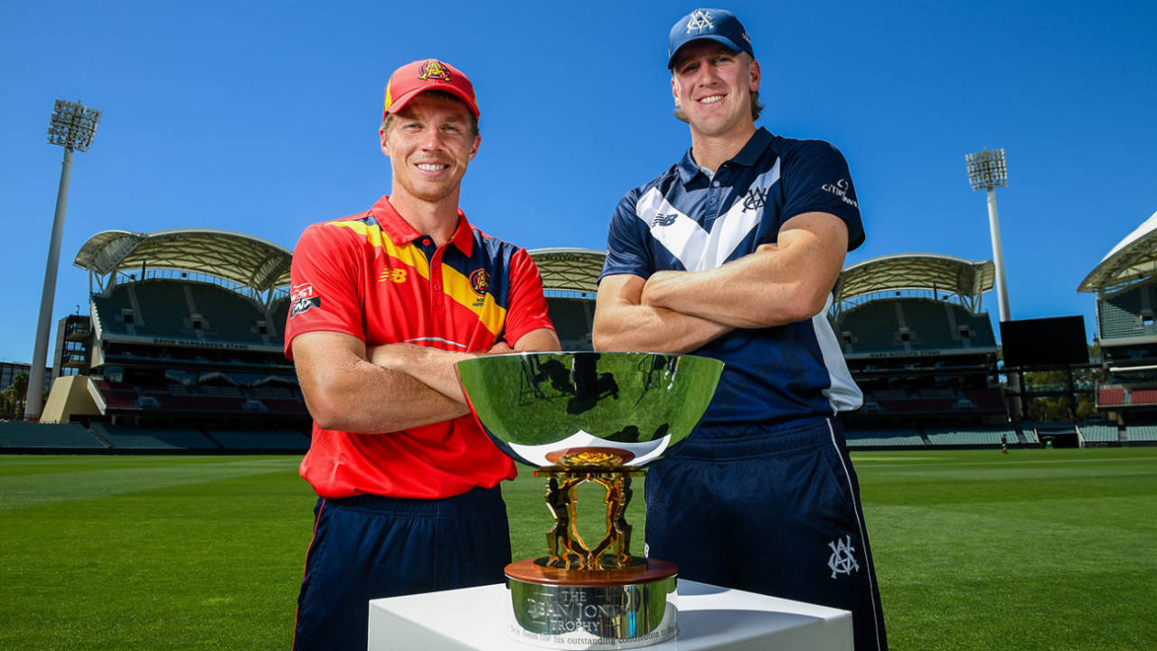 Nathan McSweeney and Will Sutherland pose with the Dean Jones Trophy, Adelaide, February 28, 2025