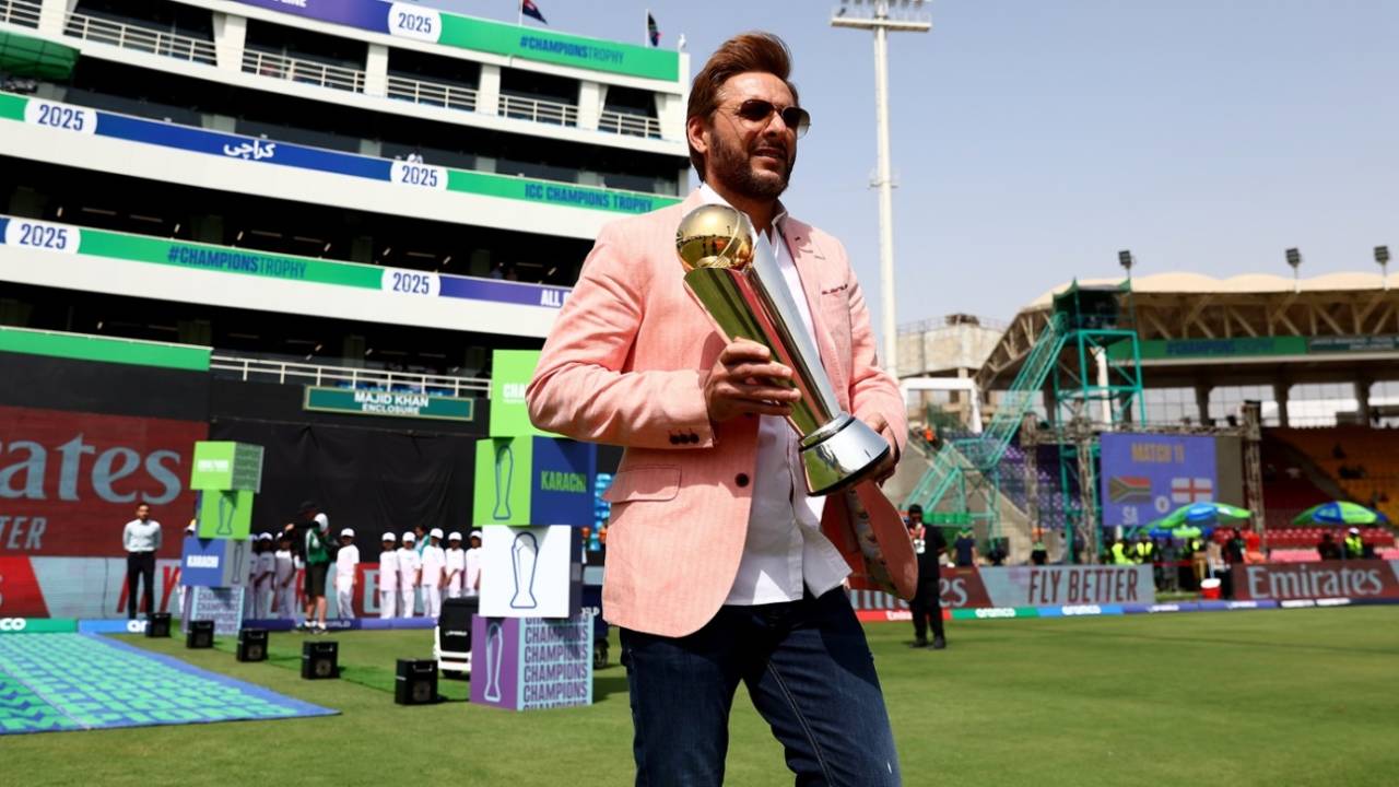 Former Pakistan captain Shahid Afridi walks out with the Champions Trophy, South Africa vs England, Group B, ICC Men's Champions Trophy, Karachi, March 1, 2025
