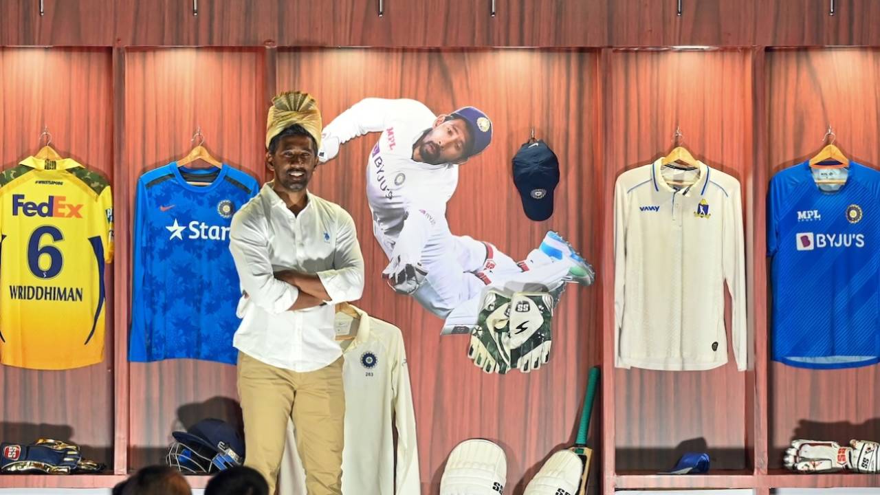 Wriddhiman Saha proudly poses in front of his jerseys, Kolkata, March 3, 2025