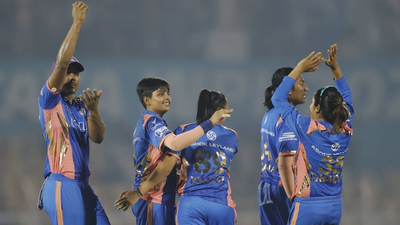 The Mumbai Indians fielders celebrate after Harleen Deol was run out, Mumbai Indians vs Gujarat Giants, WPL 2025, Mumbai, March 13, 2025