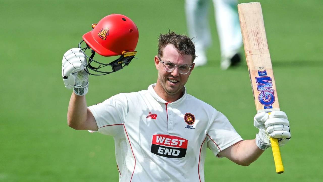 Conor McInerney celebrates his maiden first-class century, South Australia vs Queensland, day 1, Sheffield Shield, Karen Rolton Oval, March 15, 2025