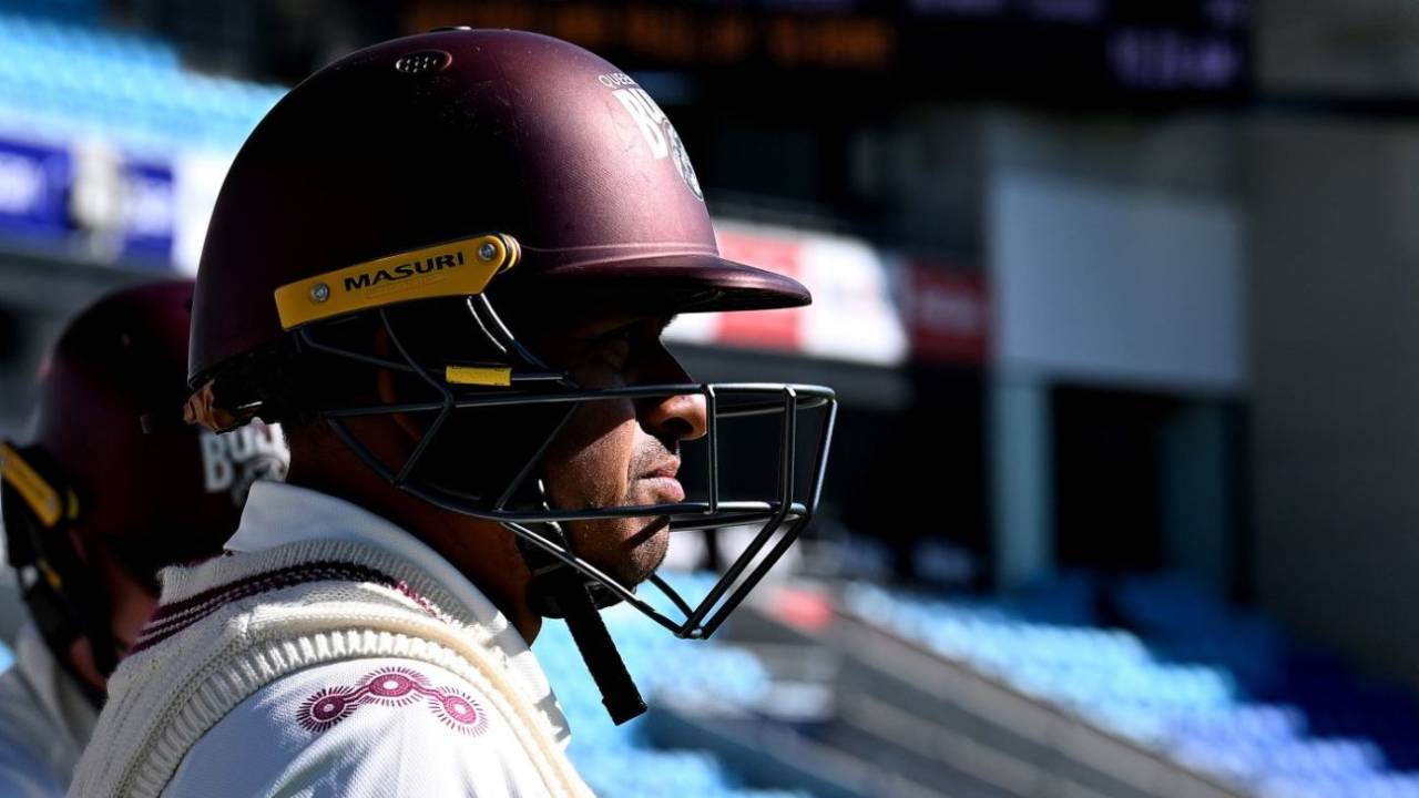 Usman Khawaja waits to walk out to bat for Queensland