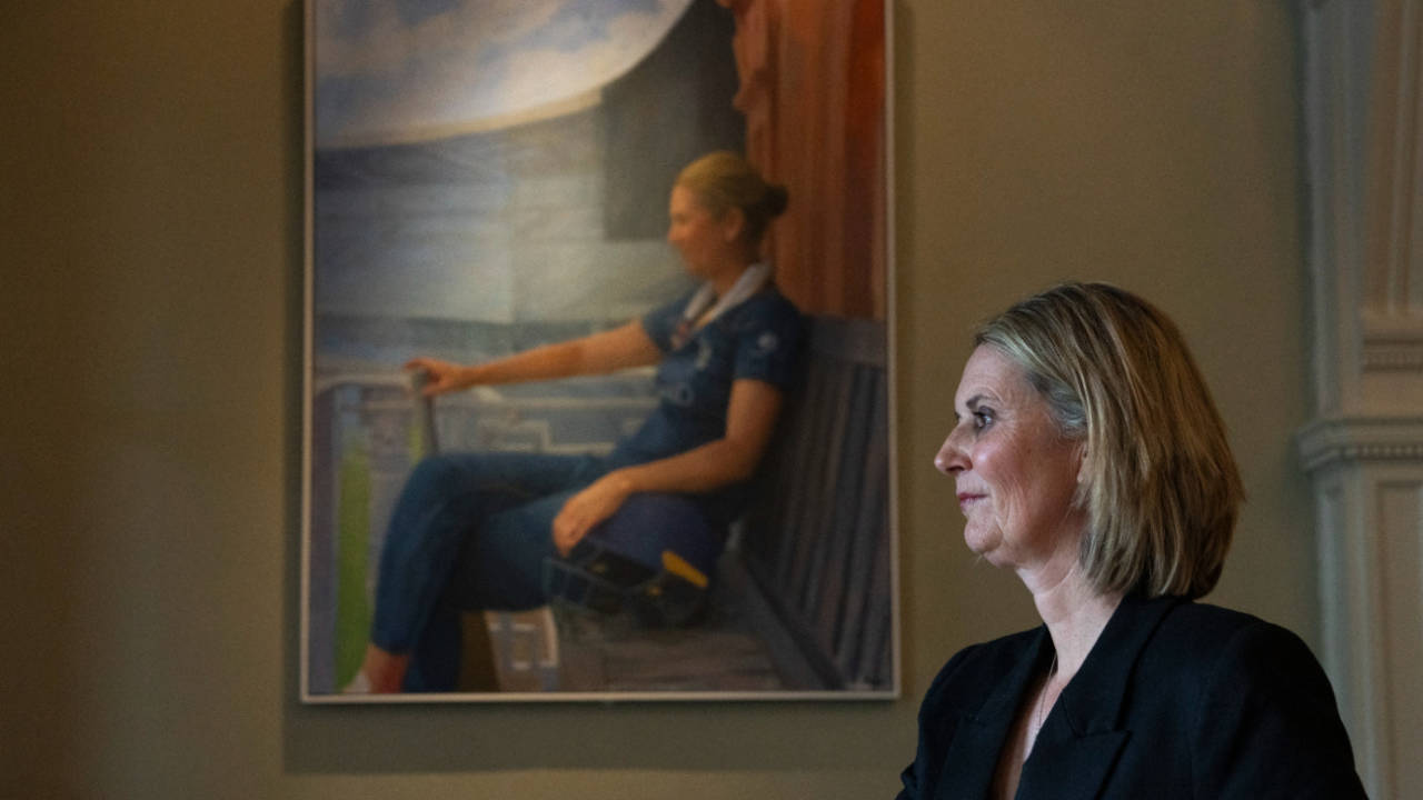 Charlotte Edwards poses in front of her portrait in the Long Room at Lord's, April 24, 2025