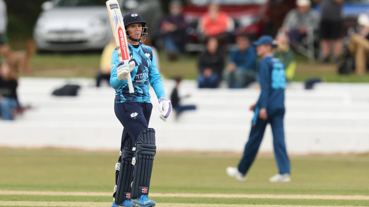 Lauren Winfield-Hill raises her bat on reaching fifty, Yorkshire vs Derbyshire, T20 Women's County Cup, Harrogate, May 5, 2025