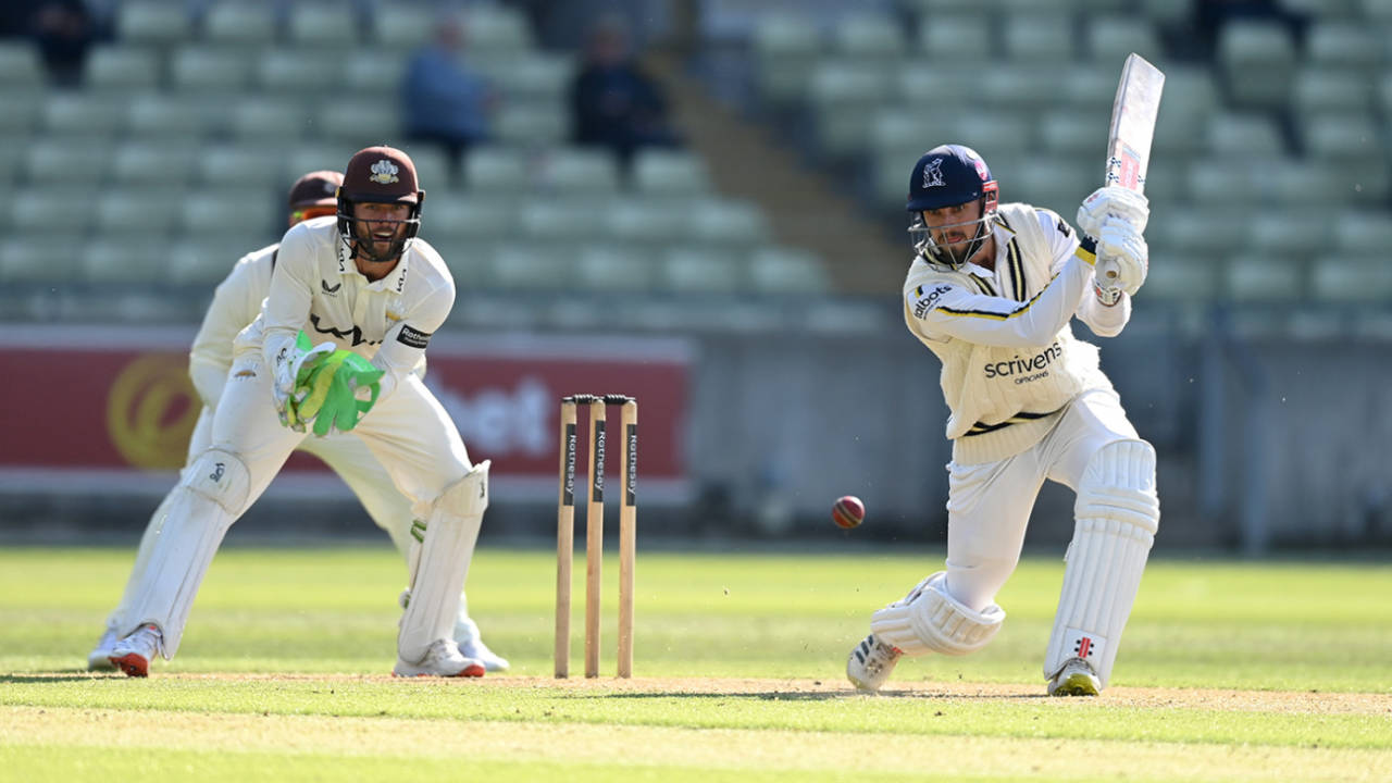 Ed Barnard drives as Ben Foakes looks on, Warwickshire vs Surrey, County Championship, Edgbaston, May 9, 2025