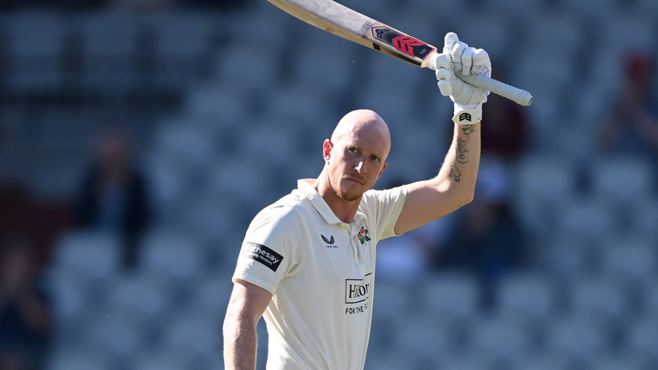 Luke Wells raises his bat on reaching three figures, Lancashire vs Derbyshire, County Championship, Division Two, Old Trafford, May 16, 2025