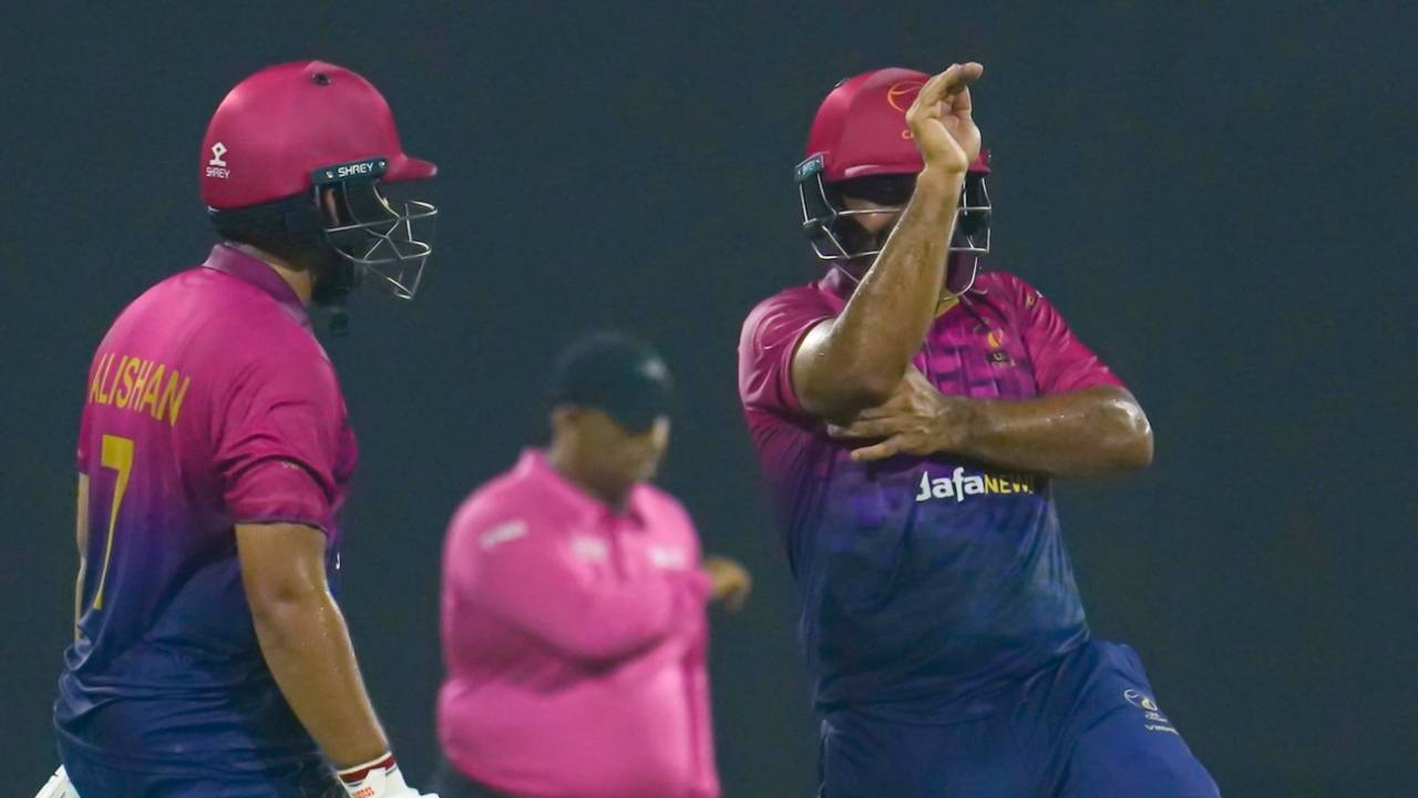 Asif Khan does the snake gesture as Alishan Sharafu looks on after hitting the winning runs, UAE vs Bangladesh, 3rd T20I, Sharjah, May 21, 2023