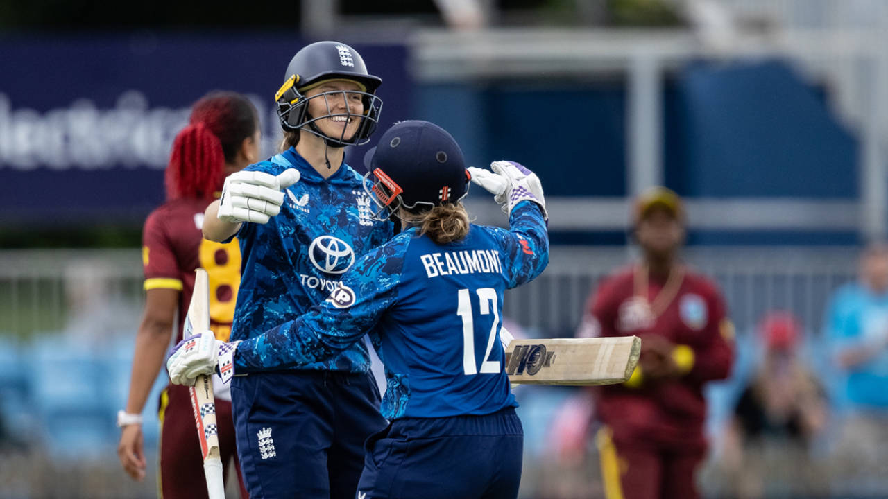 Amy Jones gets a hug from her partner after notching a maiden hundred, England vs West Indies, 1st women's ODI, Derby, May 30, 2025