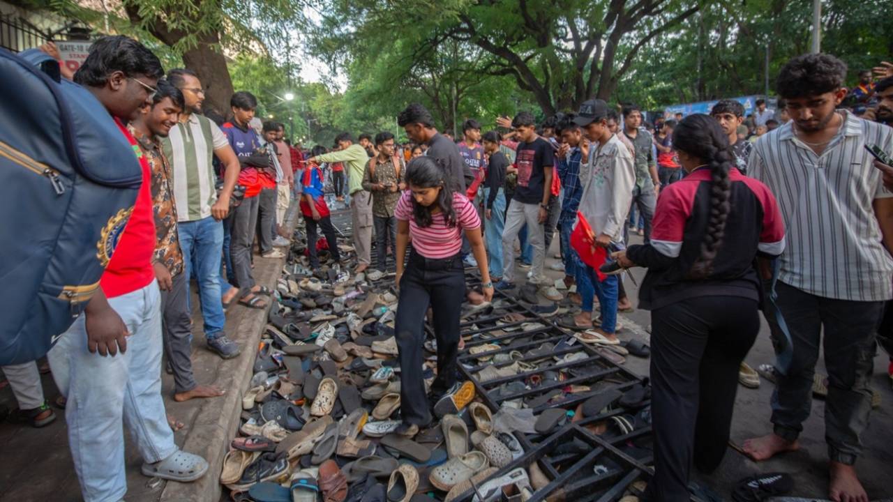 Fans in Bengaluru look for shoes and other belongings, Bengaluru, June 4, 2025