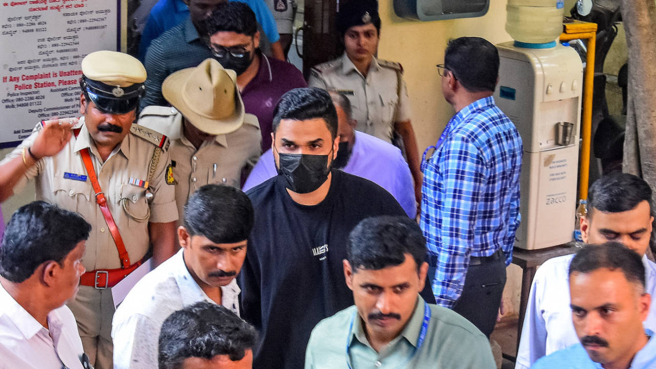 RCB's Head of Marketing and Revenue Nikhil Sosale being taken to court from the Cubbon Park police station after his arrest, Bengaluru, June 6, 2025