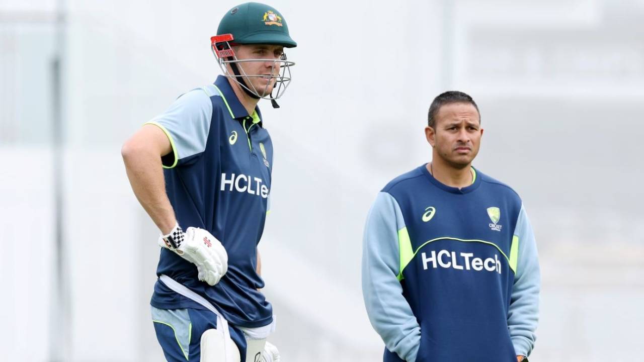 Cameron Green waits to bat at training alongside Usman Khawaja