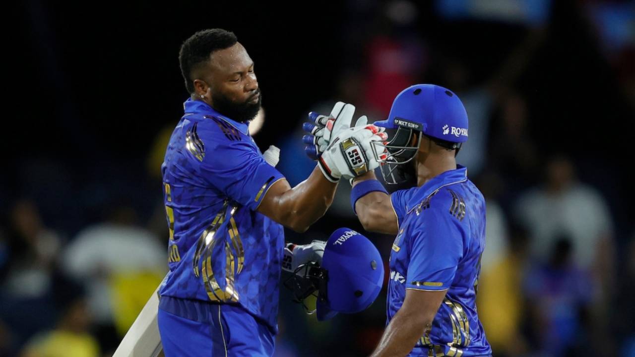 Kieron Pollard and Nicholas Pooran celebrate after completing the job, MI New York vs Texas Super Kings, MLC 2025 Qualifier 2, Dallas, July 11, 2025