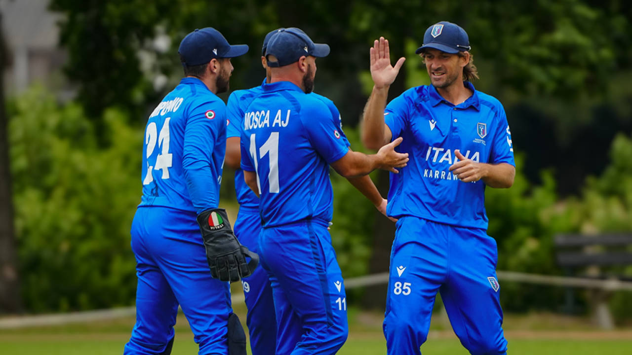 Joe Burns celebrates a wicket with his Italy team-mates, Italy vs Netherlands, ICC Men's T20 World Cup Europe Region Final, The Hague, July 11, 2025