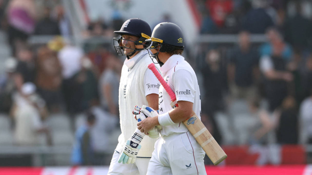 Joe Root and Ollie Pope walk off after the day's play, England vs India, 4th Test, 2nd Day, Manchester, July 24, 2025 