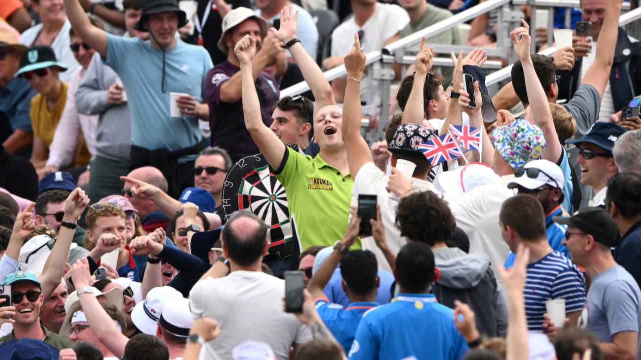 A patron wearing the Michael van Gerwen shirt parties in the stands, England vs India, 4th Test, Manchester, 4th day, July 26, 2025