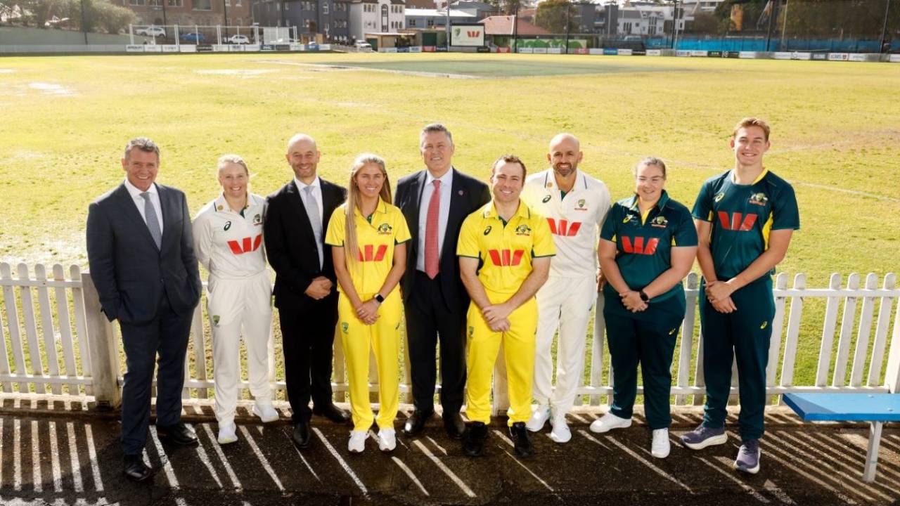 (From left to right) Mike Baird, Alyssa Healy, Todd Greenberg, Courtney Webeck, Westpac CEO Anthony Miller, Steffan Nero, Nathan Lyon, Christina Coulson and Charlie Anderson pose during a Cricket Australia Partnership Announcement at Manly Oval in Sydney