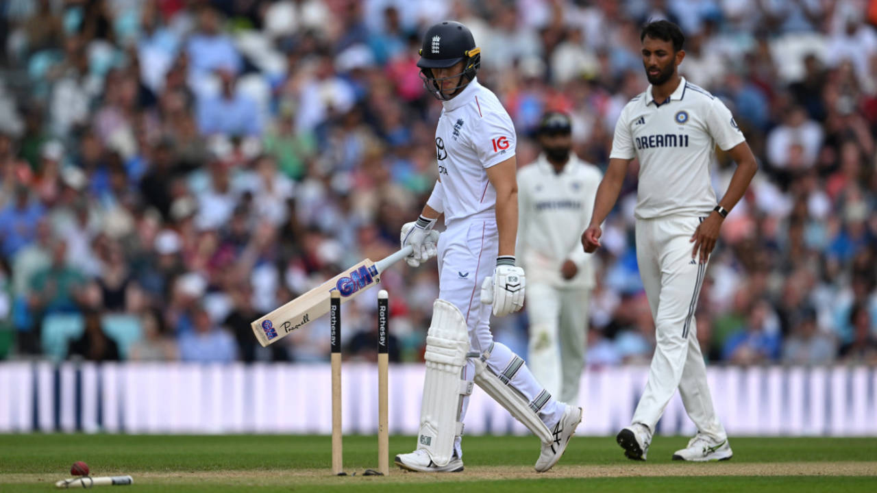 Jacob Bethell and Prasidh Krishna look on at the flattened stumps, England vs India, 5th Test, 4th Day, The Oval, August 3, 2025