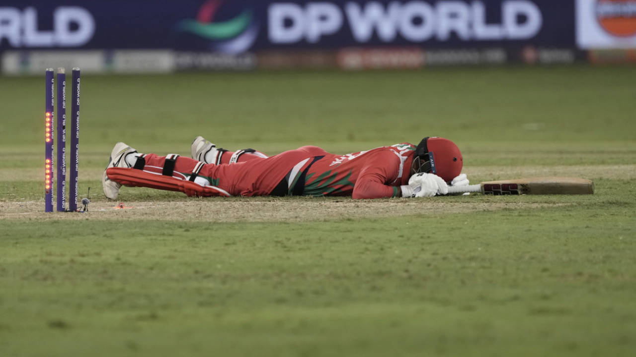 Vinayak Shukla lies on the ground, Pakistan vs Oman, Men's T20 Asia Cup, Dubai, September 12, 2025