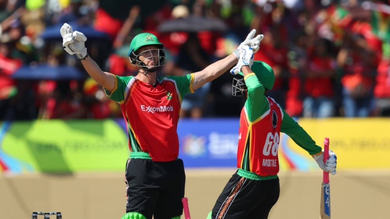 Gudakesh Motie joins Dwaine Pretorius to celebrate Guyana Amazon Warriors' victory, Guyana Amazon Warriors vs Trinbago Knight Riders, CPL 2025, Providence, September 13, 2025