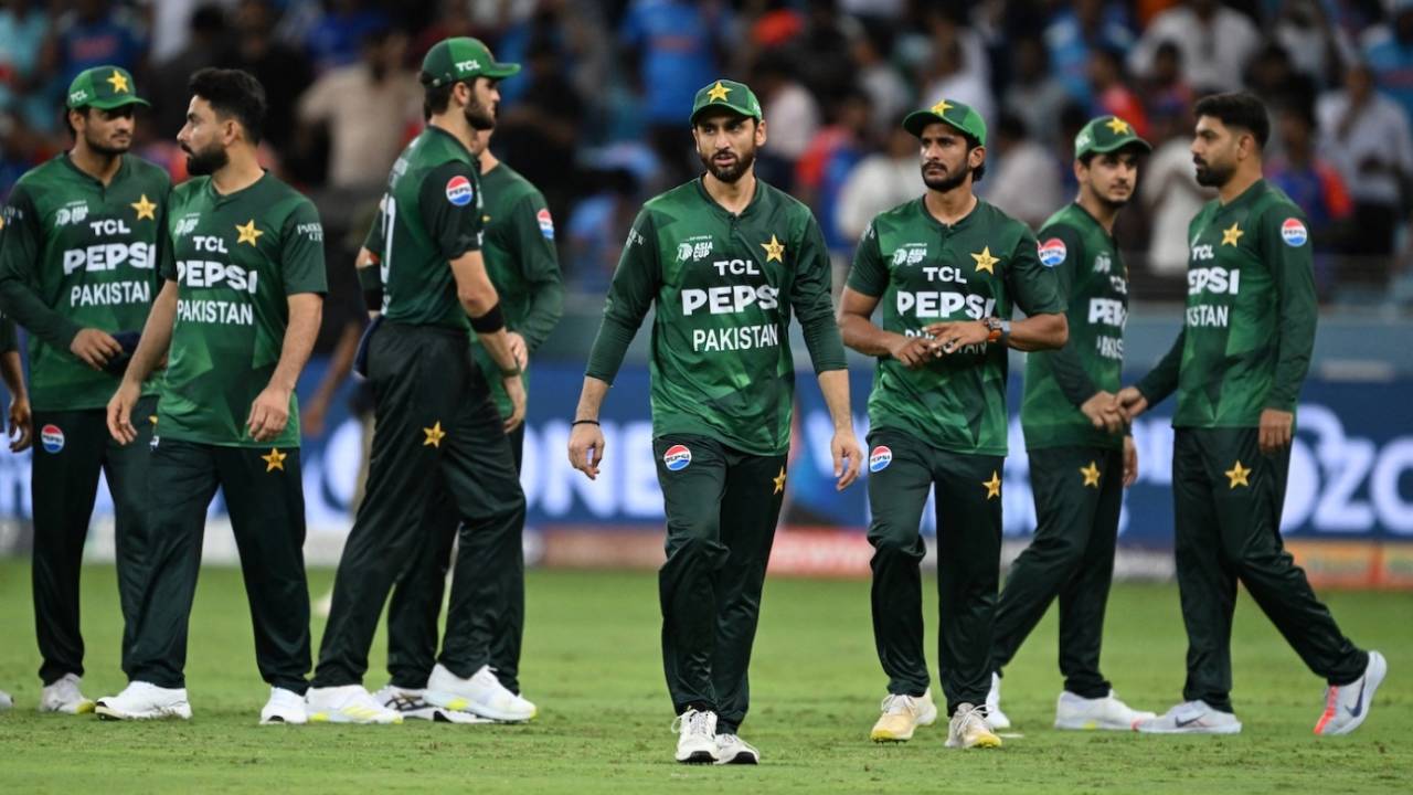 Salman Agha walks off, with his team-mates behind him, after the defeat, India vs Pakistan, Asia Cup 2025, Dubai, September 14, 2025