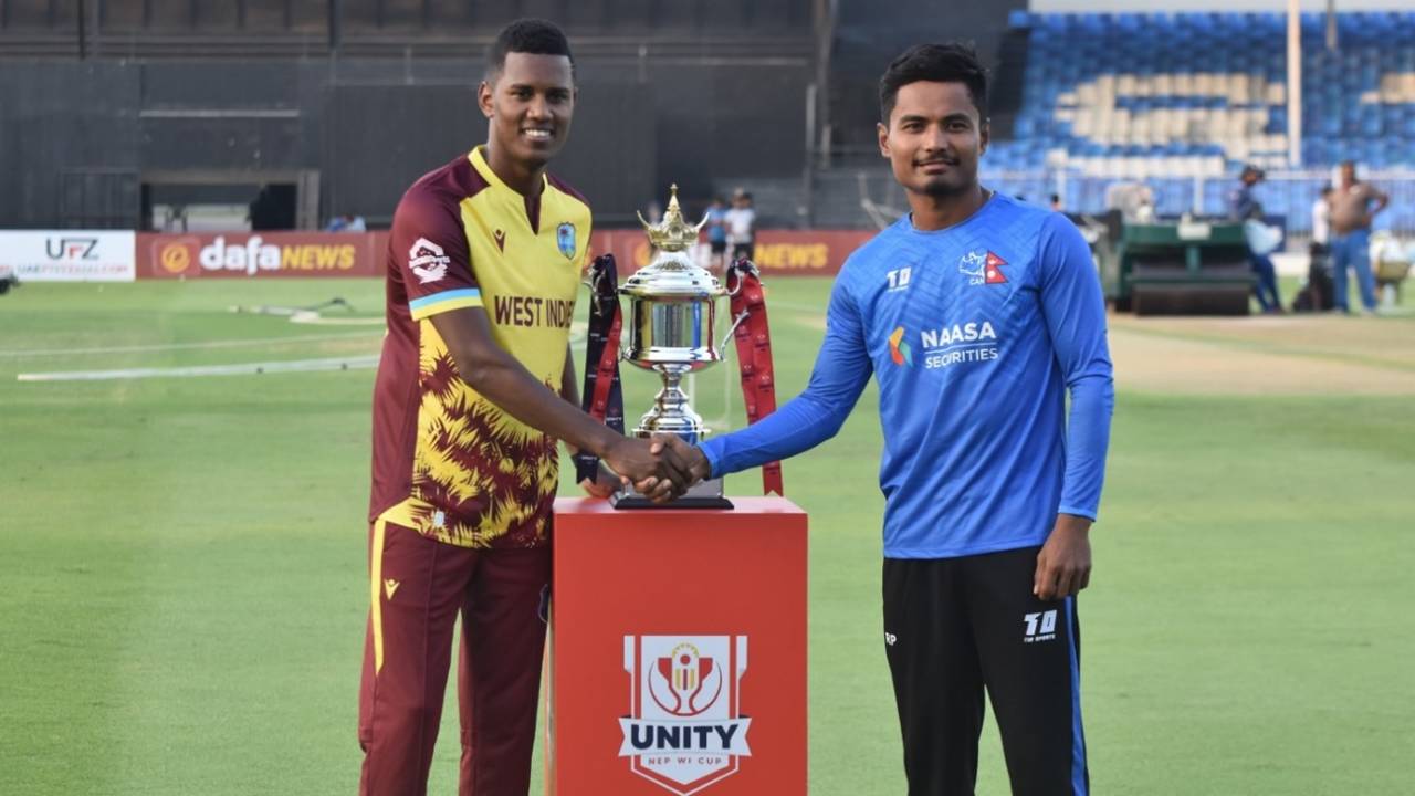 Akeal Hosein and Rohit Paudel pose with the series trophy, Nepal vs West Indies, 1st T20I, Sharjah, September 26, 2025