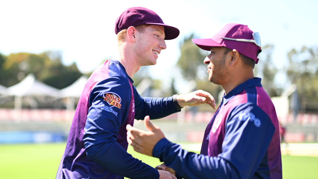 Hugh Weibgen is congratulated on his first-class debut by Usman Khawaja, Queensland vs Tasmania, Sheffield Shield, Allan Border Field, October 4, 2025