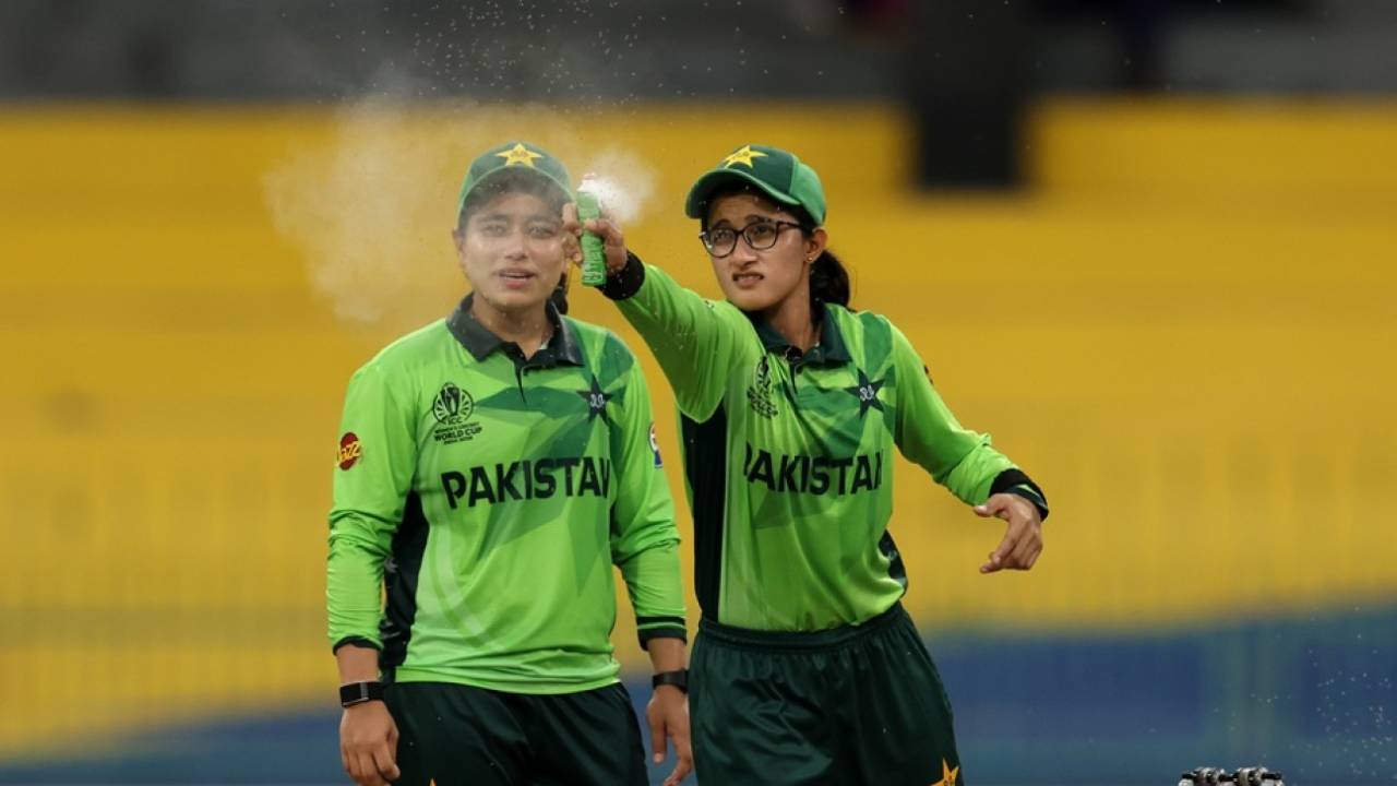 Muneeba Ali sprays a bug repellent as Fatima Sana looks on, India vs Pakistan, Women's ODI World Cup, Colombo, October 5, 2025