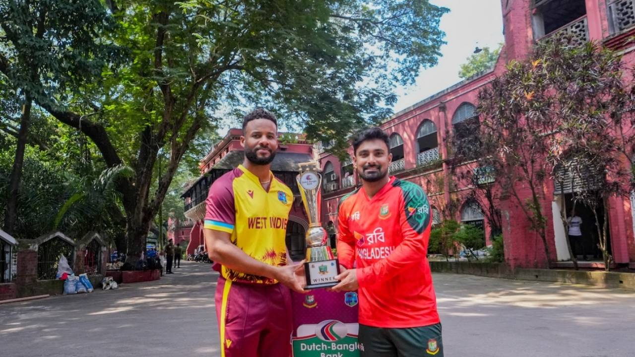 Shai Hope and Litton Das pose with the T20I series trophy in front of the 128-year-old Central Railway Building, Bangladesh vs West Indies, 1st T20I, Chattogram, October 26, 2025