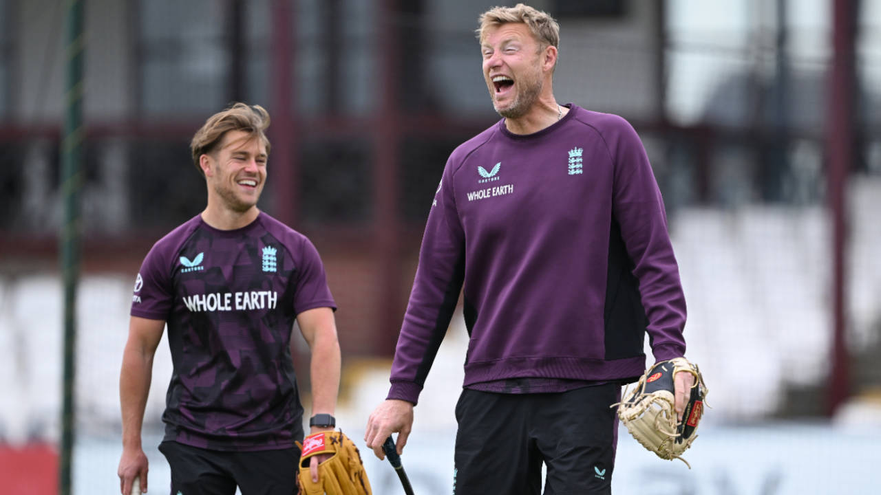 Andrew Flintoff shares a joke with nutritionist Charlie Binns during a Lions training session, June 4, 2025