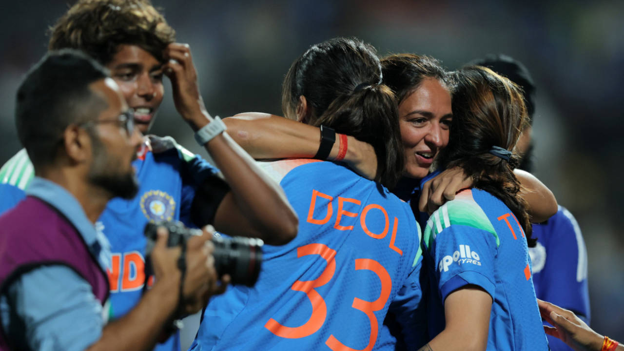 An emotional Harmanpreet Kaur is engulfed by her team-mates, India vs Australia, Women's World Cup semi-final, Navi Mumbai, October 30, 2025