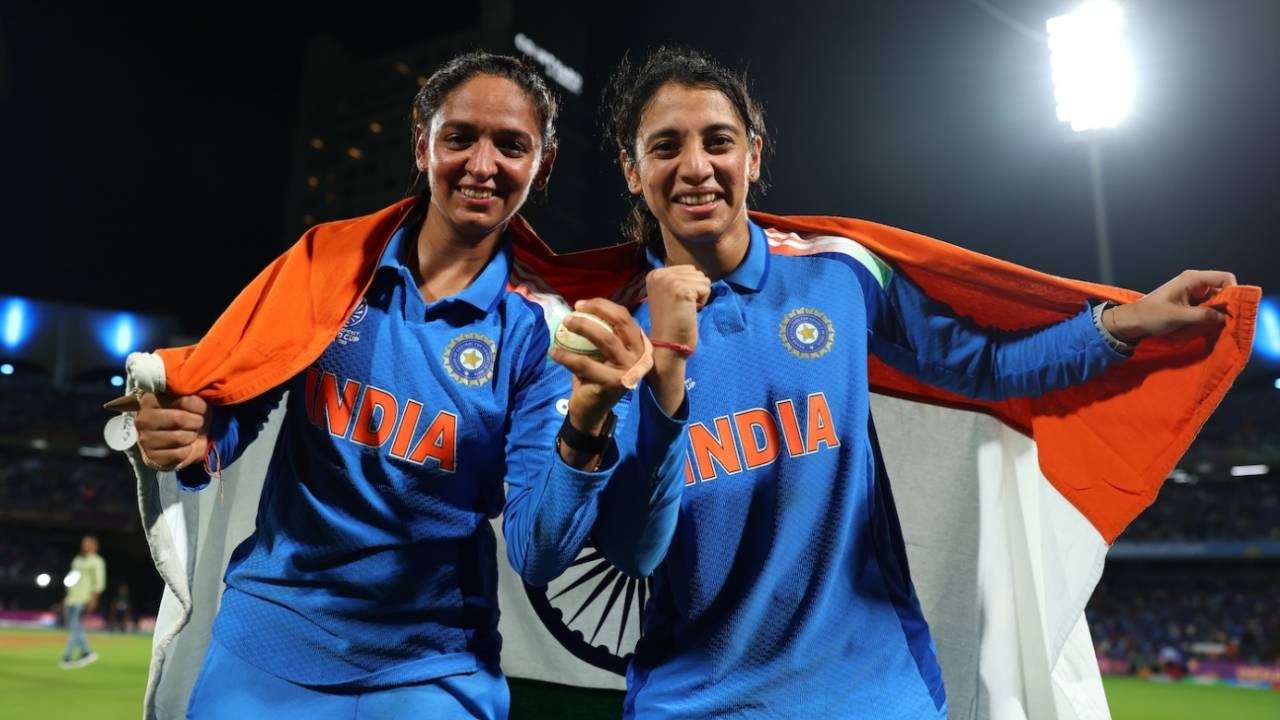 Harmanpreet Kaur, still clutching the match ball, and Smriti Mandhana celebrate, India vs South Africa, Women's ODI World Cup final, Navi Mumbai, November 2, 2025