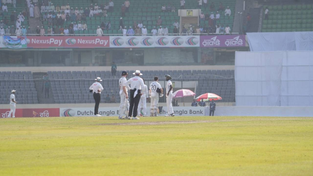 Players and umpires pause to take stock after strong tremors were felt at the ground, Bangladesh vs Ireland, 2nd Test, Dhaka, 3rd day, November 21, 2025