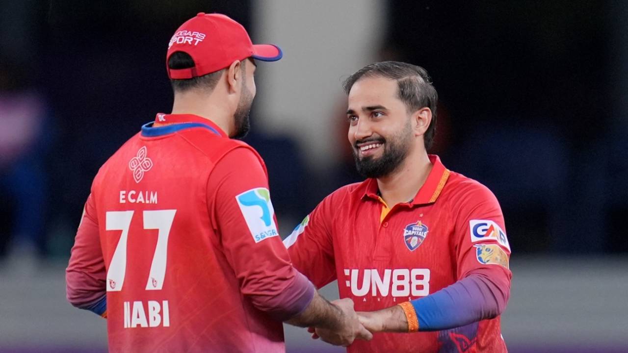 Waqar Salamkheil celebrates a wicket with Mohammad Nabi, Abu Dhabi Knight Riders vs Dubai Capitals, ILT20 2025-26, Dubai, January 1, 2026