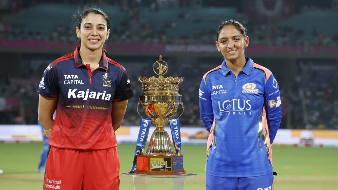 Smriti Mandhana and Harmanpreet Kaur pose with the WPL trophy before toss, Mumbai Indians vs Royal Challengers Bengaluru, WPL, Navi Mumbai, January 9, 2026