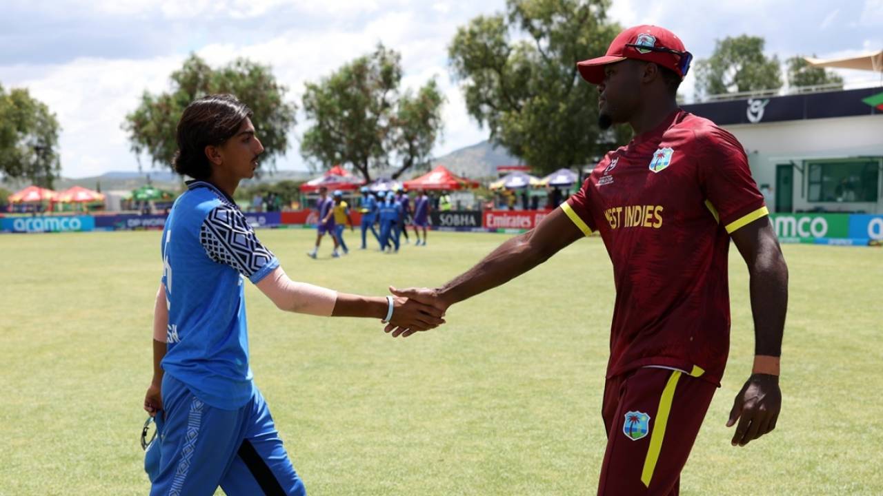 Joshua Dorne and Laksh Bakrania shake hands after the game, Zimbabwe U-19 vs Tanzania U-19, 2026 Men's U19 World Cup, Windhoek, January 15, 2026
