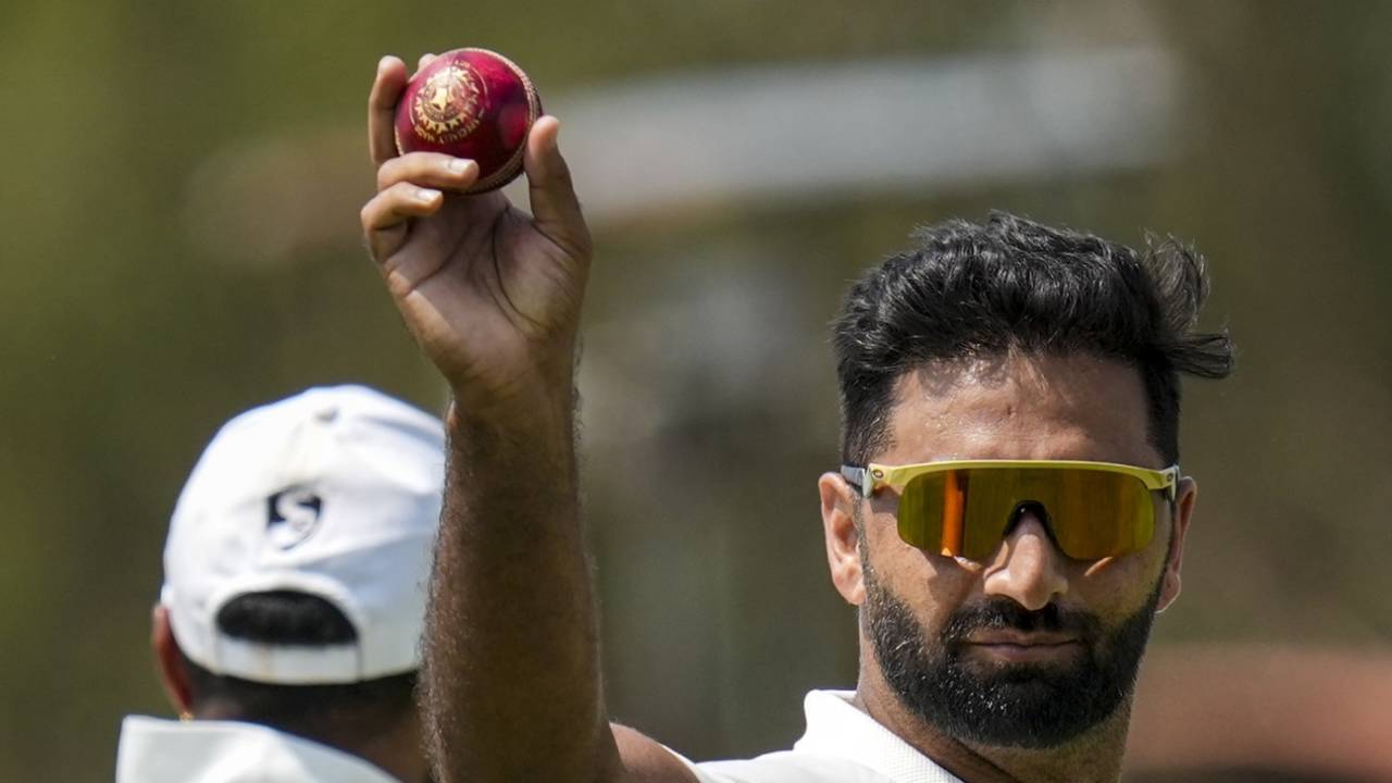 Auqib Nabi shows off the ball he completed his five-for with, Jammu & Kashmir vs Karnataka, Ranji Trophy final, Hubballi, 4th day, February 27, 2026