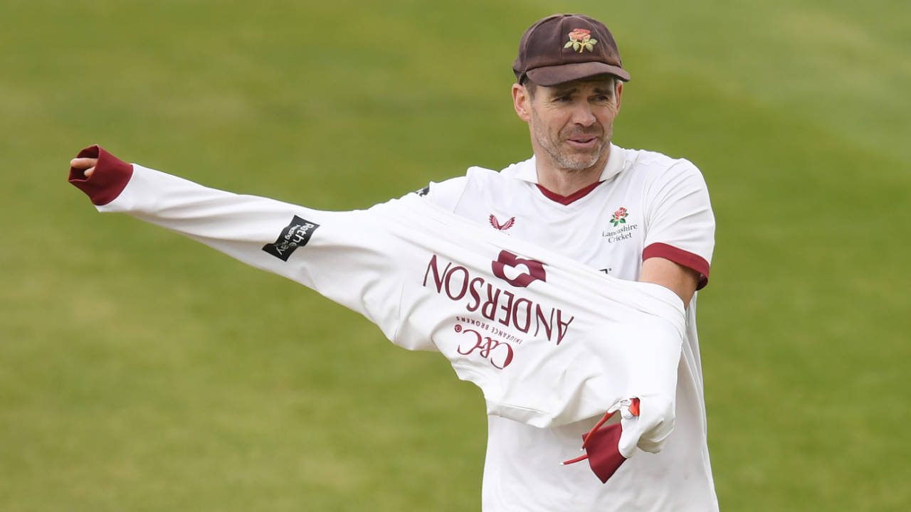 James Anderson pulls on his sweater after a wicket-taking spell, Lancashire vs Northamptonshire, Wantage Road, April 4, 2026