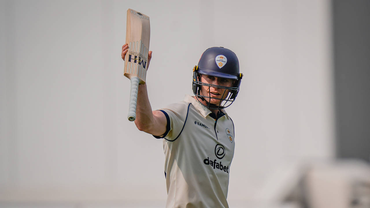 Brooke Guest raises his bat to salute the crowd after scoring a hundred, County Championship Division Two, Derbyshire vs Northamptonshire, Derby, May 9, 2026