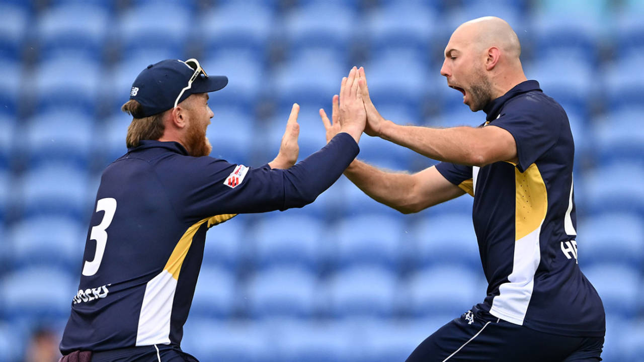 Matt Hennig (right) celebrates his first wicket of Jordan Silk, Tasmania vs Victoria, One-Day Cup, Hobart, October 24, 2026