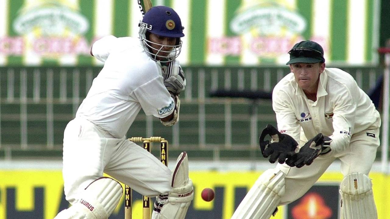Kumar Sangakkara cuts a ball as Andy Flower looks on, Sri Lanka vs Zimbabwe, 1st Test, Colombo, SSC, December 27-31, 2001