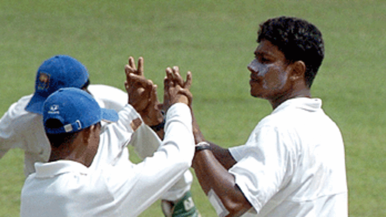 Tharanga Lakshitha celebrates the wicket of Javed Omar
