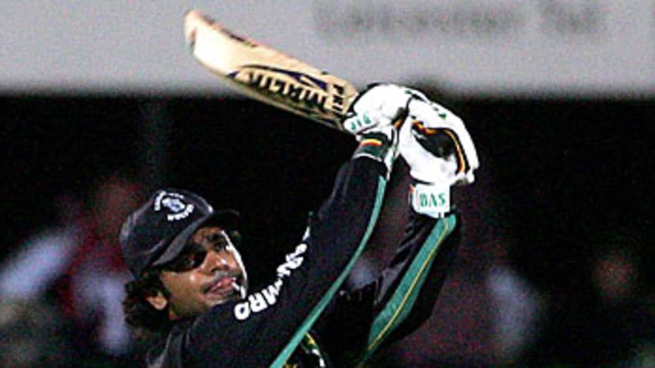 Naved Latif of Faisalabad hits a six, Wolves v Chilaw, Grace Road, September 17, 2005