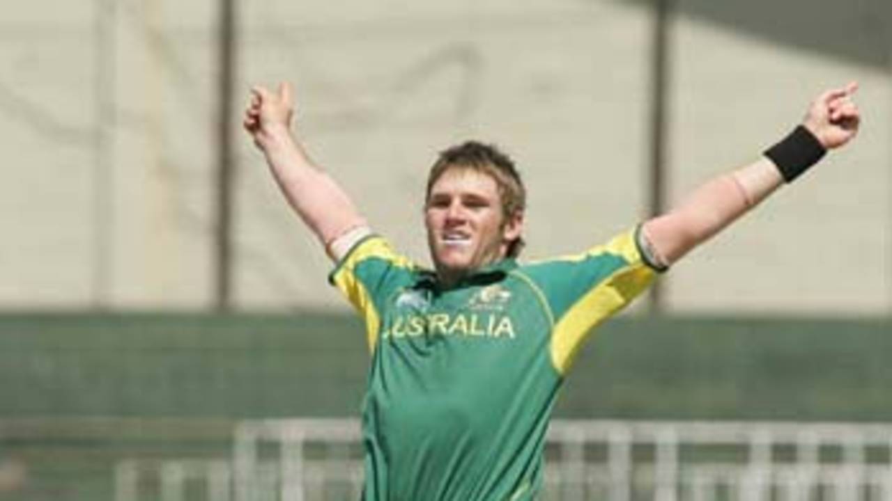 Simon Keen of Australia celebrates a wicket during his side's victory over Sri Lanka at the SSC in the Super League quarter-final of the ICC
U/19 Cricket World Cup on Saturday