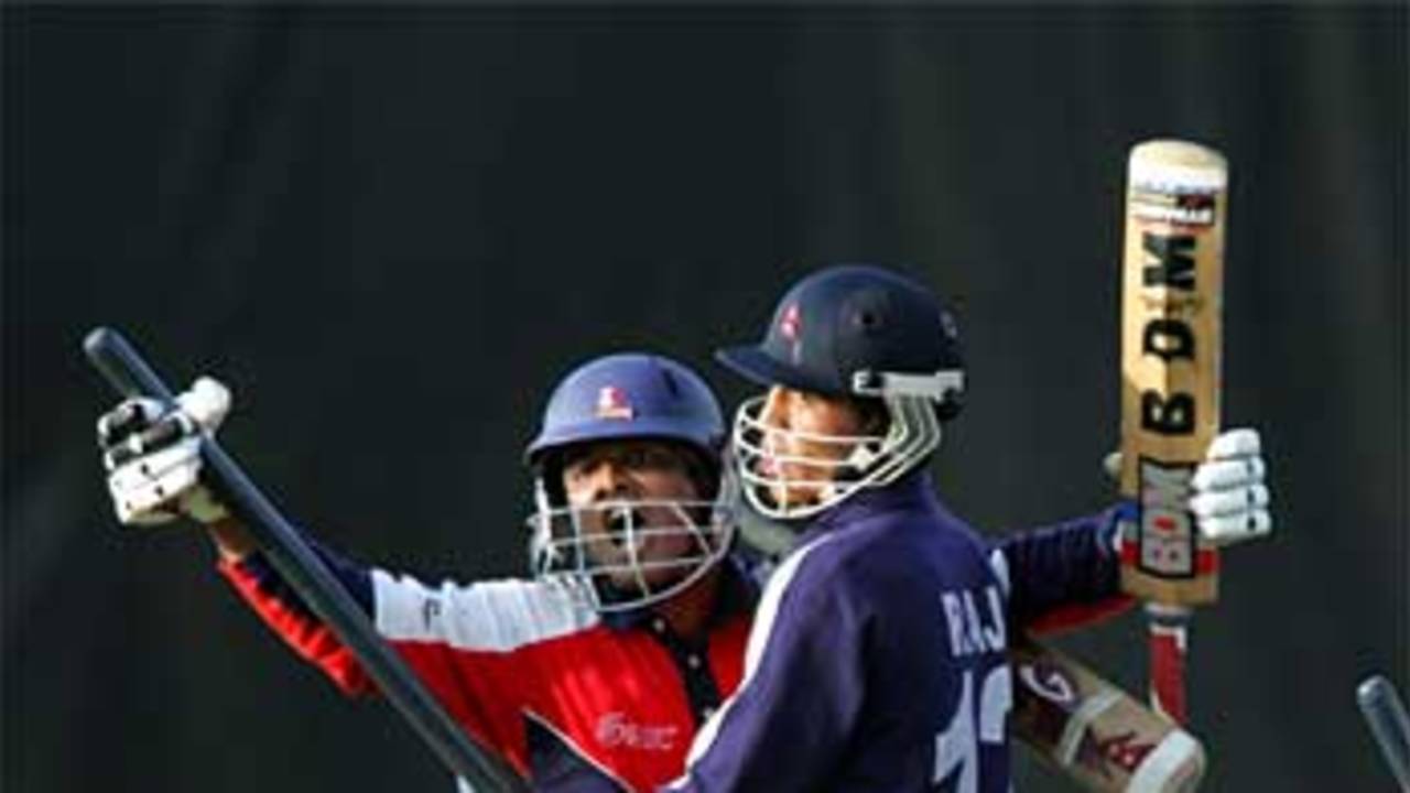 Ratan Rauniyar and Raj Shrestha embrace after Nepal's one-wicket win, Nepal v New Zealand, Under-19 World Cup Plate Final, Colombo, February 18, 2006