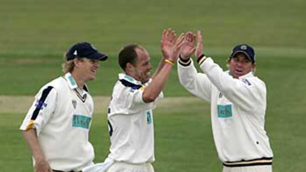 Billy Taylor is congratulated by his captain, Shane Warne on his six wickets, Hampshire v Middlesex, Southampton, May 3, 2006
